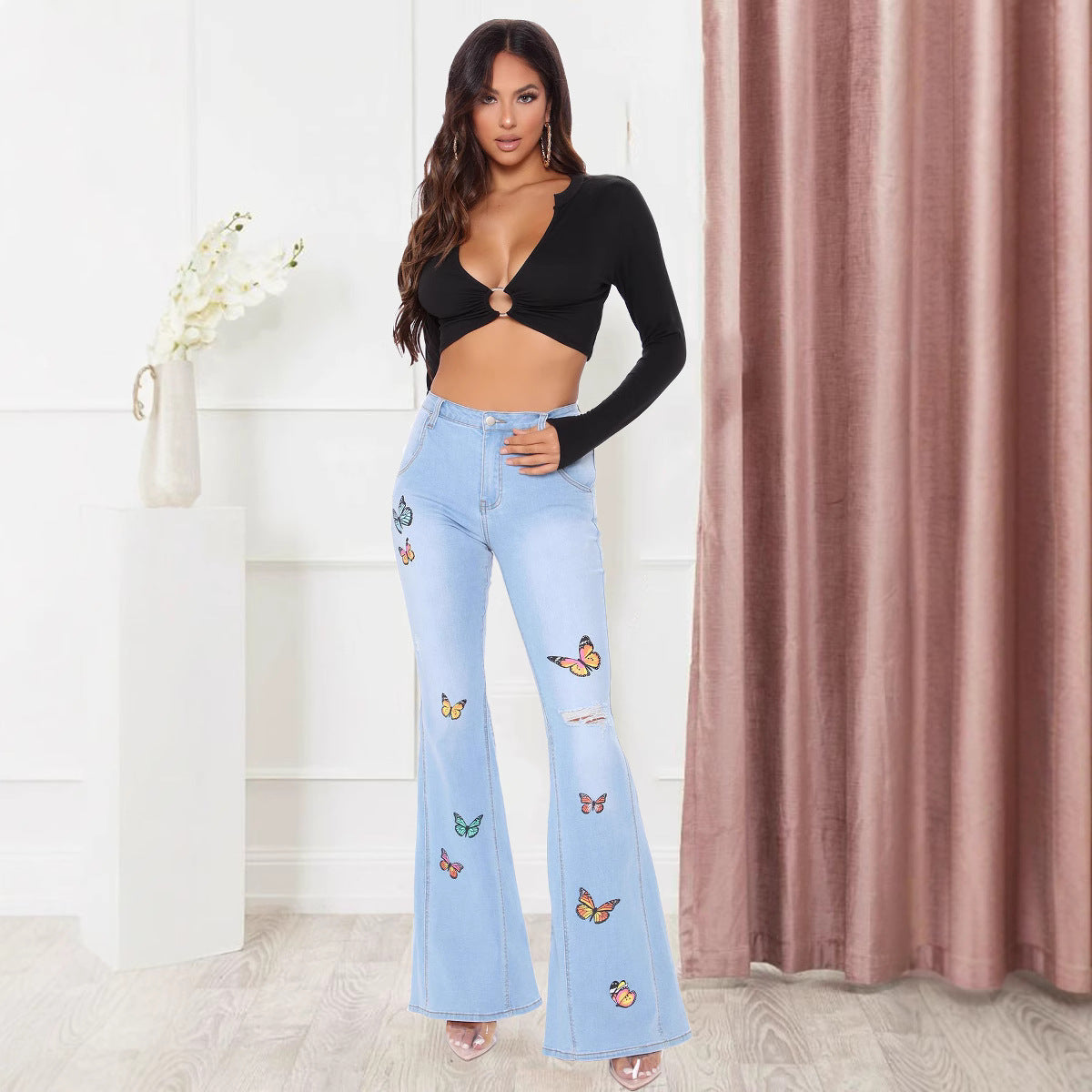 Tailored butterfly wide leg perforated high stretch flared pants